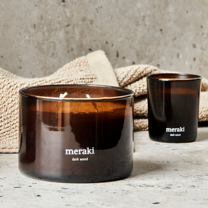 Scented candles, dark wood